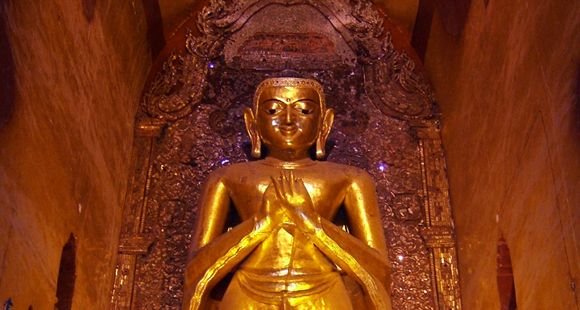 The four 9½ meter tall standing Buddha images
