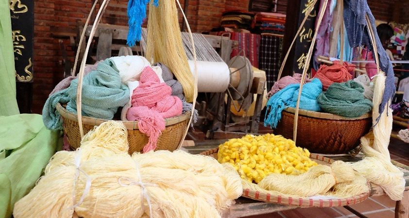 The village is much more charming with colorful silk sheets